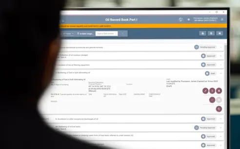 A person looking at an oil record book in OneLog on a computer screen