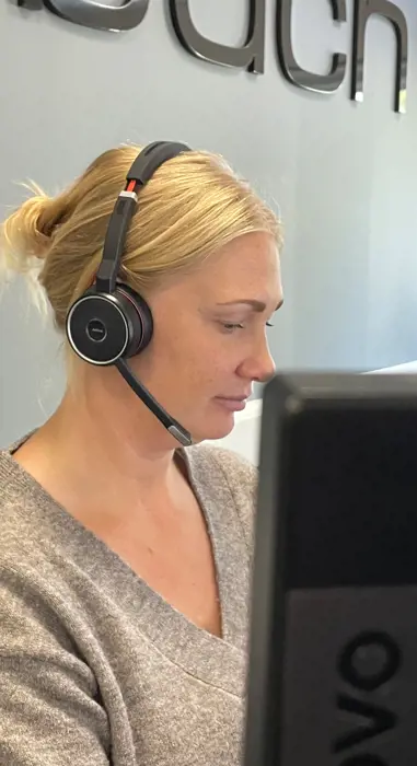 Operations employee takes a customer call